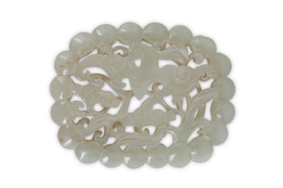 Lot 54 - A CHINESE PALE CELADON JADE RETICULATED 'BAT' PLAQUE.