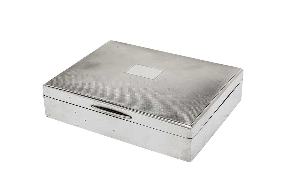 Lot 368 - A George VI sterling silver cigarette box, London 1937 by Mappin and Webb