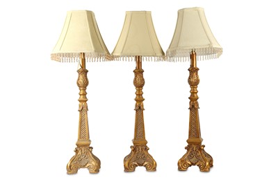 Lot 436 - Three 20th Century gilt resin table lamps