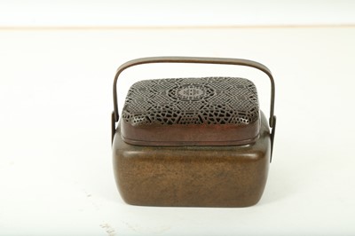 Lot 24 - A CHINESE BRONZE HAND WARMER AND COVER.