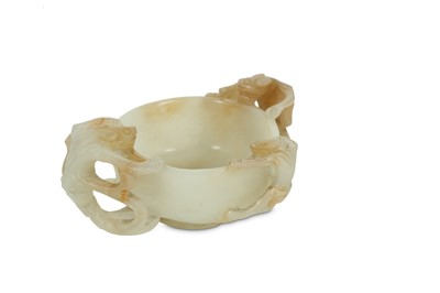 Lot 52 - A CHINESE WHITE JADE 'CHILONG' CUP.