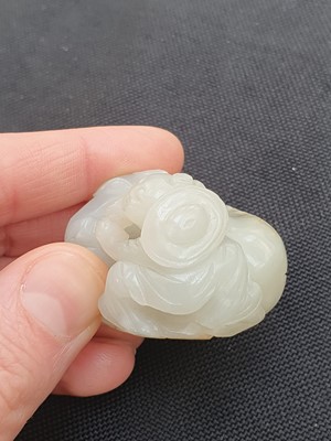 Lot 649 - A CHINESE WHITE JADE 'BOY AND BUFFALO' GROUP.