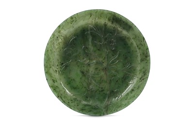 Lot 209 - A CHINESE SPINACH GREEN JADE 'BIRD AND FLOWERS' DISH.