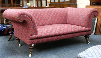 Lot 461 - A two-seater sofa with scroll over arms,...