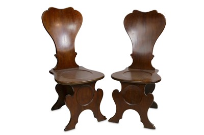 Lot 263 - A pair of George III mahogany sgabello hall chairs
