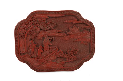 Lot 238 - A CHINESE CINNABAR LACQUER QUATREFOIL BOX AND COVER.