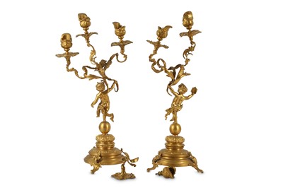 Lot 435 - A pair of 20th Century gilt metal candelabras