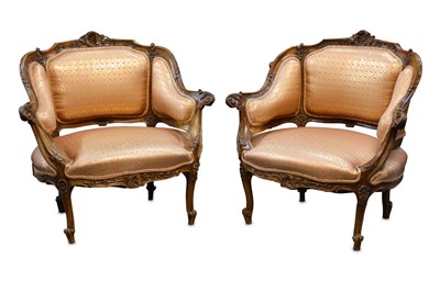 Lot 286 - A pair of 19th Century French walnut Rococo style fauteuil tub chairs