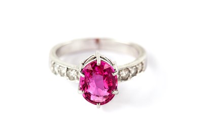 Lot 15 - A pink sapphire and diamond ring