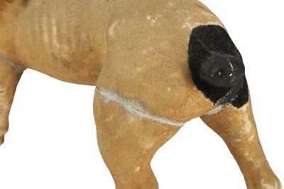 Lot 423 - An early 20th century papier mache pull along French growler bull dog automaton