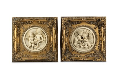 Lot 392 - A pair of mid 20th century relief cast plaster plaques