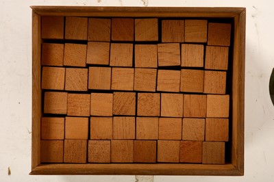 Lot 131 - AN EARLY 20TH CENTURY BOXED SET OF WOODEN GEOMETRIC CUBES