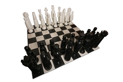 Lot 129 - A 1960'S RESIN GIANT GARDEN CHESS SET WITH LATER VINYL BOARD