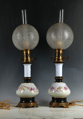 Lot 482 - A pair of Victorian porcelain and metal...