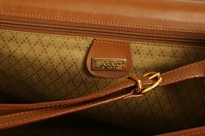 Lot 213 - A GUCCI VINTAGE TAN SUEDE WEEKEND BAG