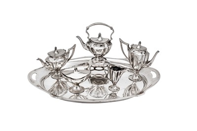 Lot 379 - A mid-20th century German miniature sterling silver five-piece tea and coffee service on tray, circa 1950