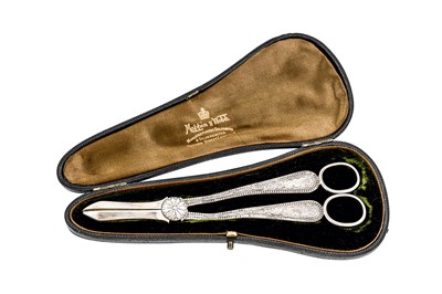 Lot 203 - A cased pair of Victorian sterling silver grape scissors, Sheffield 1893 by Mappin and Webb