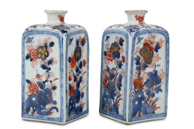 Lot 134 - A PAIR OF CHINESE IMARI SQUARE-SECTION BOTTLES.