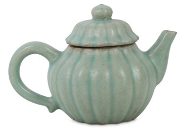 Lot 592a - A CHINESE CELADON-GLAZED LOBED TEAPOT AND COVER.