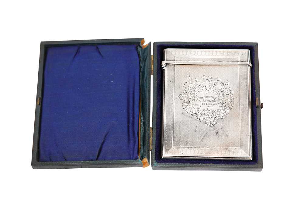 Lot 377 - A cased Victorian sterling silver card case, Birmingham 1863 by Edward Smith