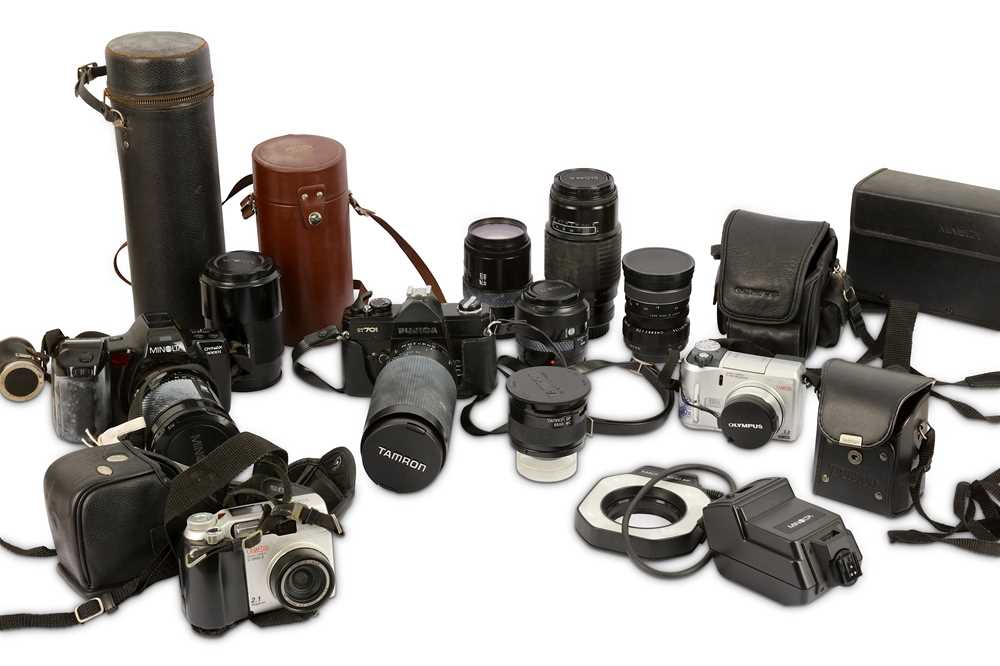 A Collection of Various Cameras, Lenses & Accessories
