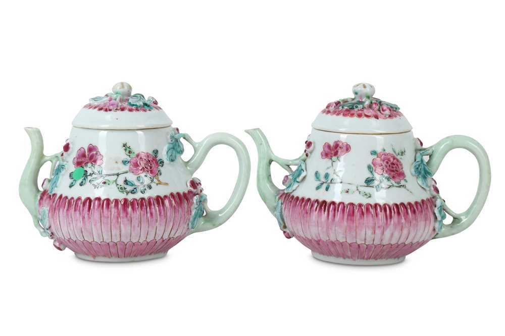 Lot 106 - A PAIR OF CHINESE FAMILLE ROSE 'BLOSSOMS' TEAPOTS AND COVERS.
