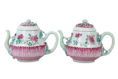 Lot 106 - A PAIR OF CHINESE FAMILLE ROSE 'BLOSSOMS' TEAPOTS AND COVERS.