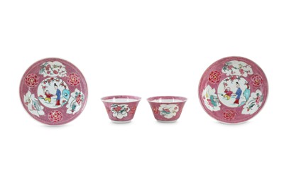 Lot 107 - A PAIR OF CHINESE FAMILLE ROSE CUPS AND SAUCERS.