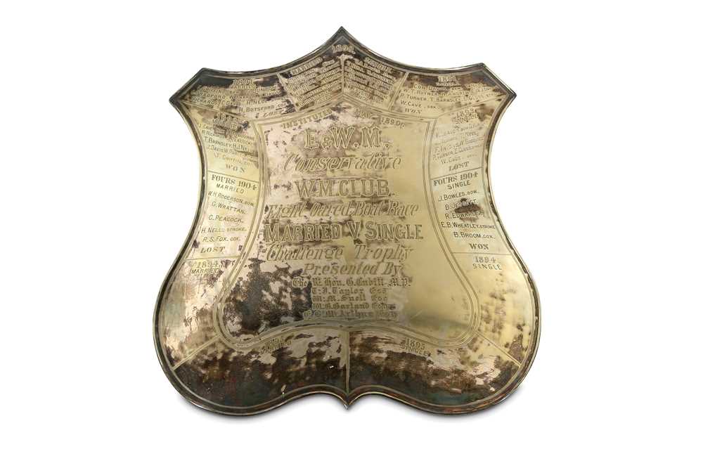 Lot 465 - A late 19th century shield shaped silver plated trophy plaque for the eight oared boat race