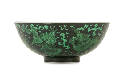 Lot 250 - A CHINESE BLACK-GROUND GREEN 'DRAGON' BOWL.