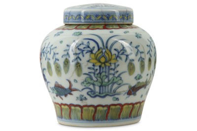 Lot 606 - A CHINESE DOUCAI 'LOTUS POND' JAR AND COVER.