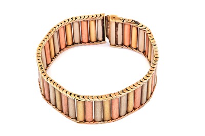 Lot 82 - A tri-coloured gold bracelet, 1989