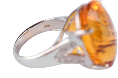 Lot 63 - A citrine and diamond ring