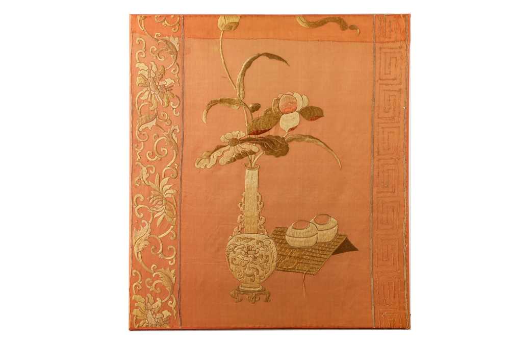 Lot 198 - A CHINESE PEACH-GROUND EMBROIDERED 'FLOWER VASE' SILK PANEL.