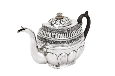 Lot 273 - A Nicholas I early 19th century Russian 84 zolotnik (875 standard) silver teapot, Moscow 1827 by B.C.o, possibly for Vasily Sorokovanov (Ivanov 3949)
