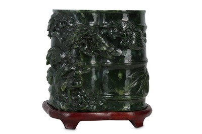 Lot 288 - A Chinese spinach green jade double 'bamboo' vase.
