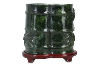 Lot 288 - A Chinese spinach green jade double 'bamboo' vase.