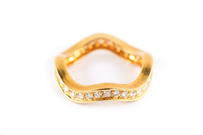 Lot 30 - A diamond eternity ring, by Cartier