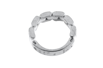 Lot 47 - A ceramic and diamond-set 'Ultra' ring, by Chanel
