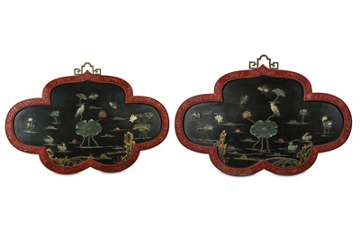 Lot 527 - A PAIR OF CHINESE LACQUER HARDSTONE-INLAID QUATREFOIL PANELS.