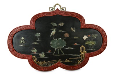 Lot 527 - A PAIR OF CHINESE LACQUER HARDSTONE-INLAID QUATREFOIL PANELS.