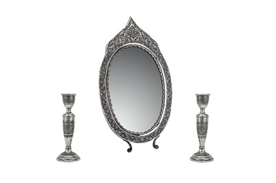 Lot 299 - A late 20th century Iranian (Persian) unmarked silver dressing table mirror and candlesticks, probably Isfahan circa 1975