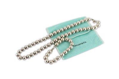 Lot 133 - A silver bead necklace and bracelet, by Tiffany & Co.