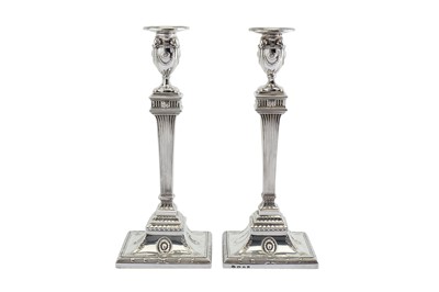 Lot 564 - A pair of George III sterling silver candlesticks, London 1777 by William Abdy (reg. 24 June 1763, d.1790)
