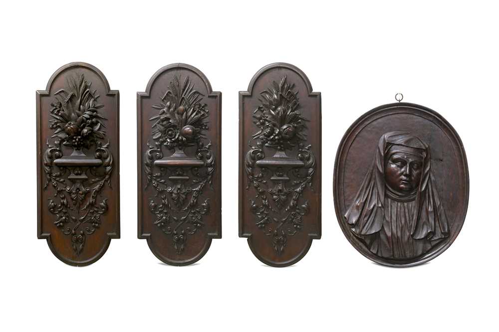 Lot 531 - Four relief carved wooden panels