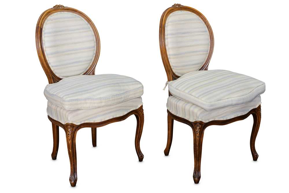 Lot 471 - A set of twelve French Louis XV style beech dining chairs