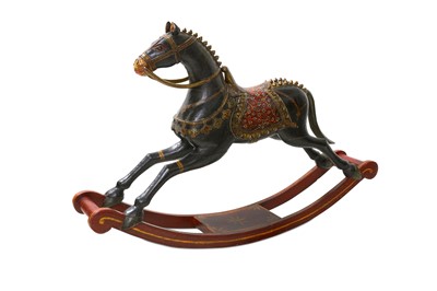 Lot 524 - A DECORATIVE INDIAN ROCKING HORSE