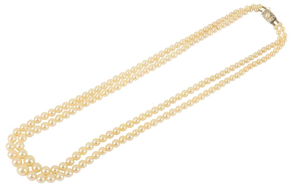 Lot 122 - A double-strand cultured pearl necklace by Mikimoto