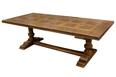 Lot 546 - A substantial French provincial fruitwood refectory table