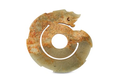 Lot 215 - A CHINESE PALE CELADON JADE SPIRAL 'DRAGON' PLAQUE.